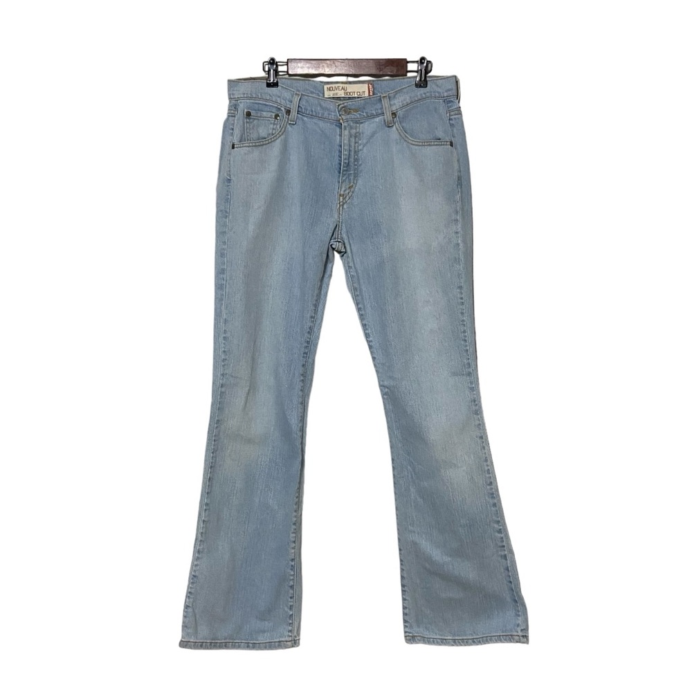 Vintage Levi’s 515 Nouveau Boot Cut Womens 14 Light Washed Jeans Blue